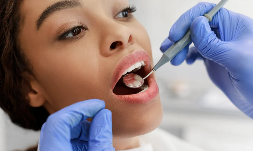 A dental patient receiving an exam